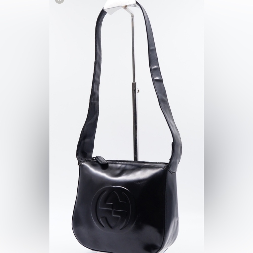 Authentic Gucci patent leather shoulder bag. 20 inches long 8 1/2 inches across